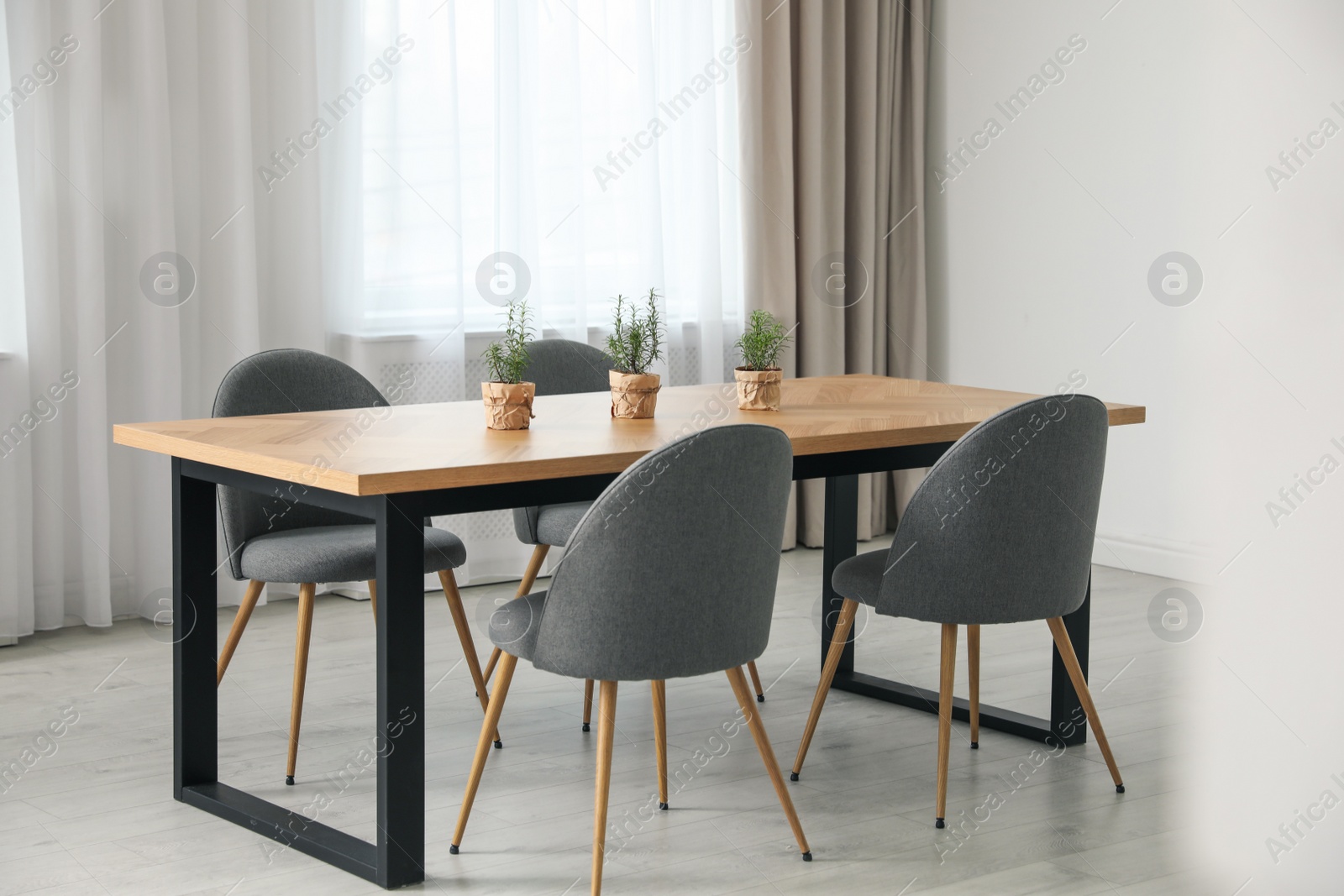 Photo of Modern room interior with chairs and table