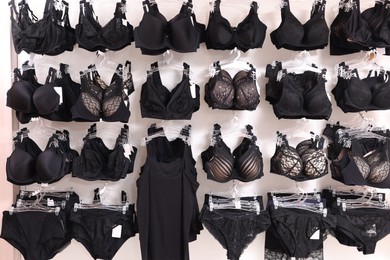 Photo of Many different beautiful women's underwear in lingerie store