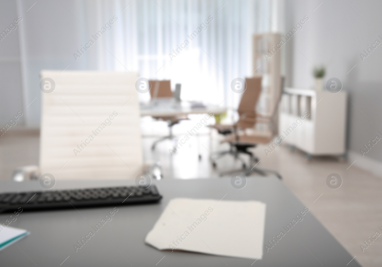 Photo of Modern brightly lit office with bokeh effect