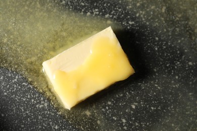 Photo of Melting butter in frying pan, top view