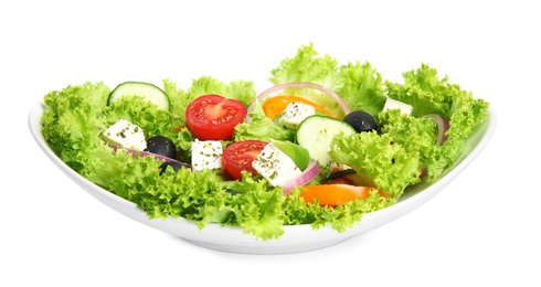 Photo of Tasty fresh Greek salad on white background