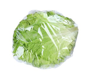 Photo of Fresh lettuce wrapped with transparent plastic stretch film isolated on white, top view