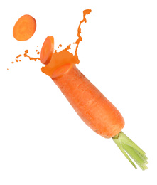 Image of Fresh cut carrot with splashes on white background