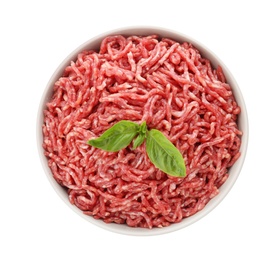 Bowl of raw minced meat with basil on white background, top view