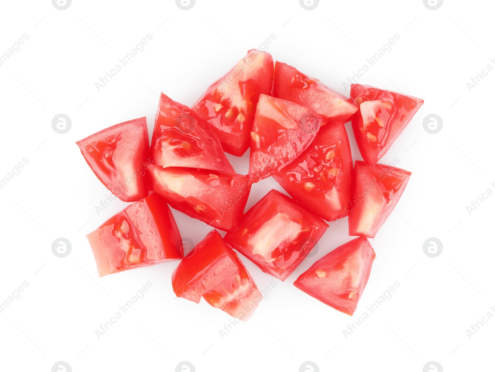 Photo of Pieces of red ripe tomato isolated on white, top view