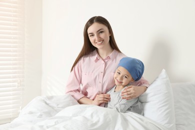 Photo of Childhood cancer. Mother and daughter in hospital