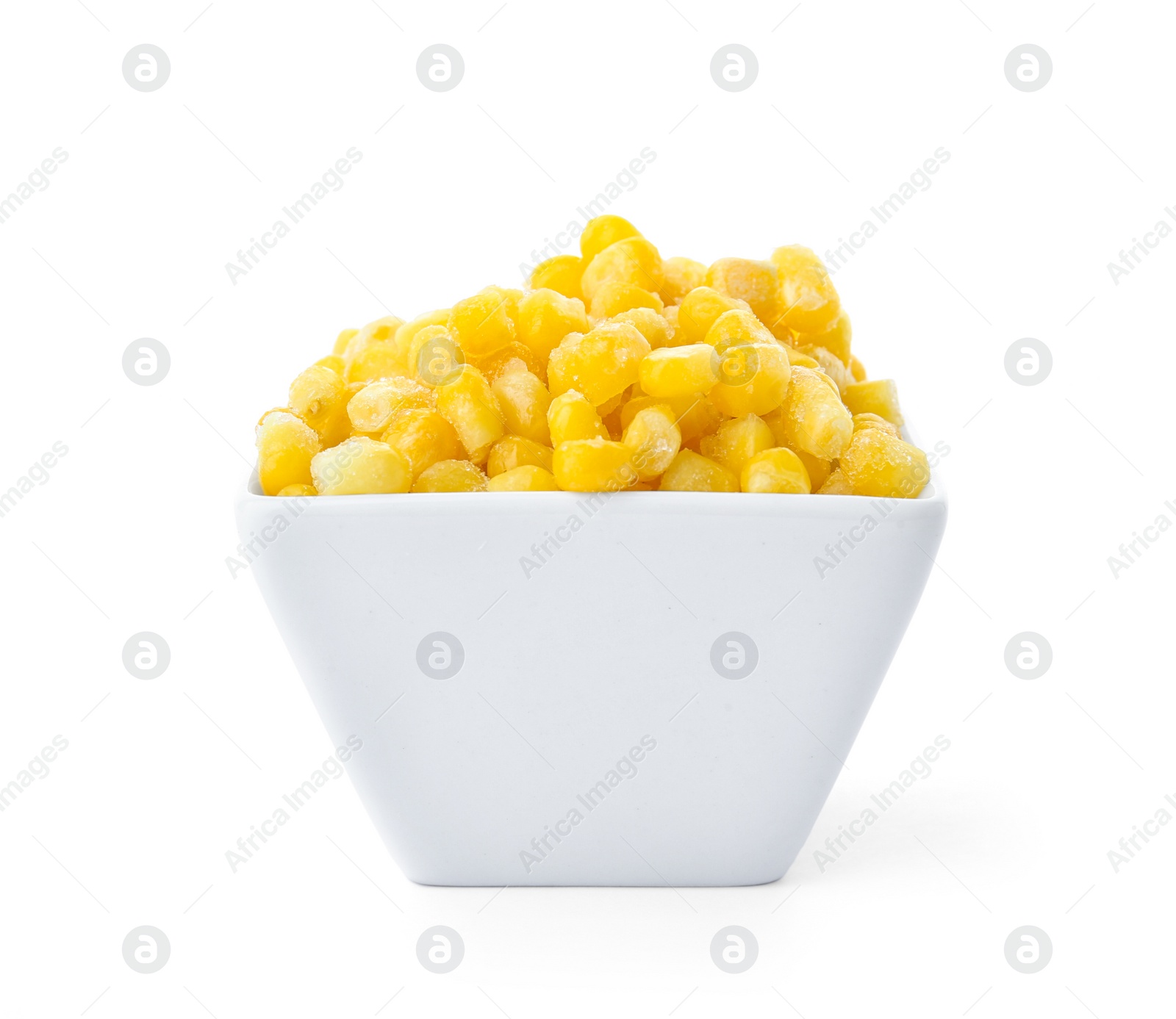Photo of Bowl with frozen corn on white background. Vegetable preservation