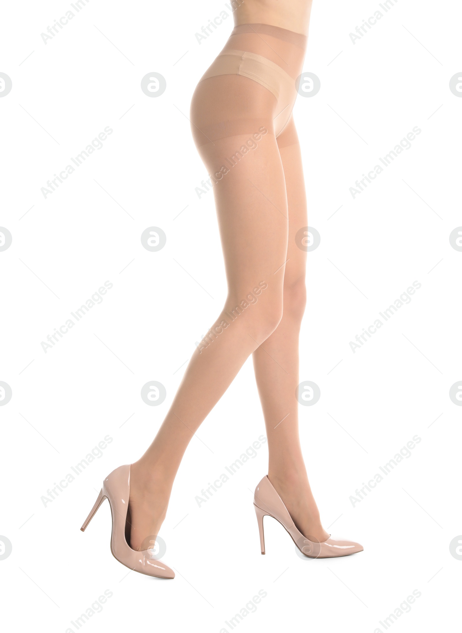 Photo of Woman wearing tights and stylish shoes isolated on white, closeup of legs