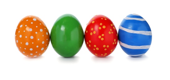 Photo of Decorated Easter eggs on white background. Festive tradition