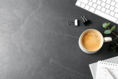 Photo of Flat lay composition with coffee on dark background, space for text