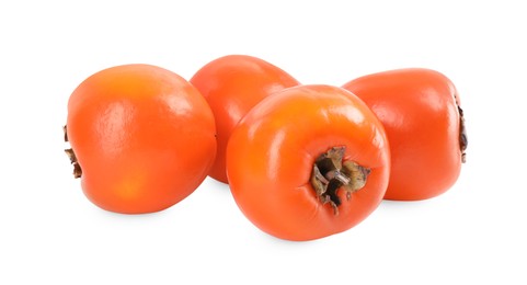 Photo of Delicious ripe juicy persimmons isolated on white