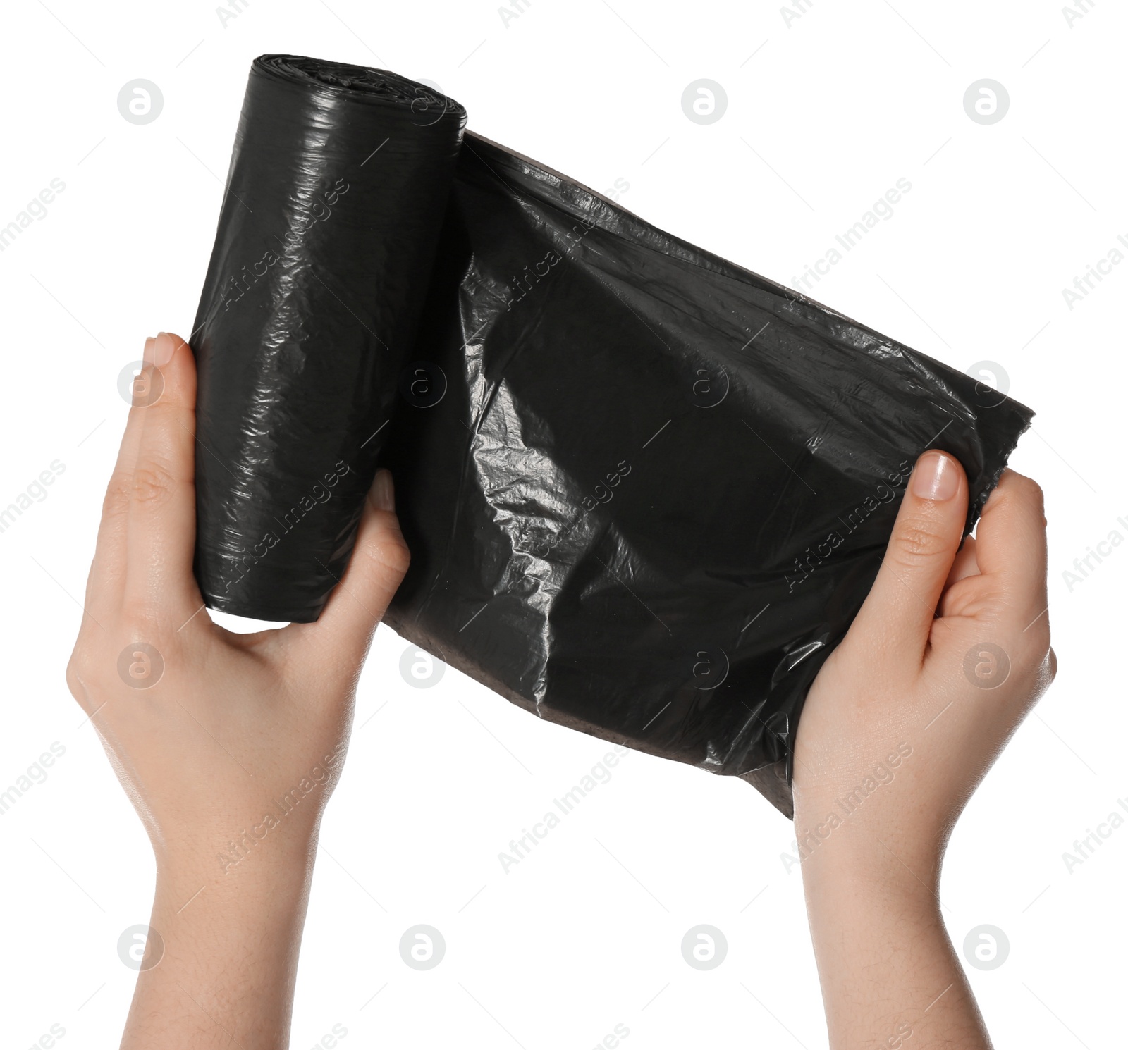 Photo of Woman holding roll of black garbage bags on white background, closeup