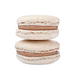 Photo of Beige macarons on white background. Delicious dessert