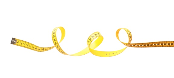 Photo of New yellow measuring tape isolated on white, top view