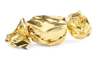 Candy in golden wrapper isolated on white