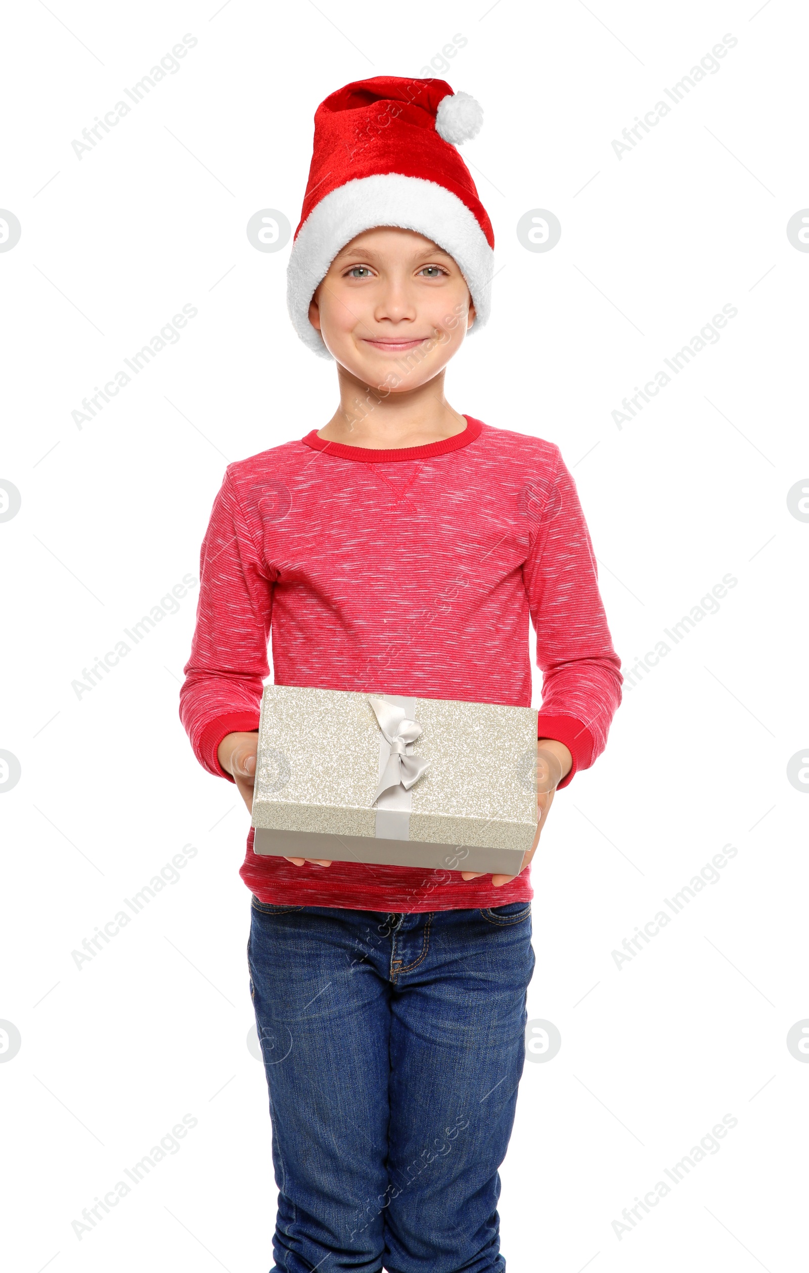 Photo of Cute little child in Santa hat with Christmas gift box on white background