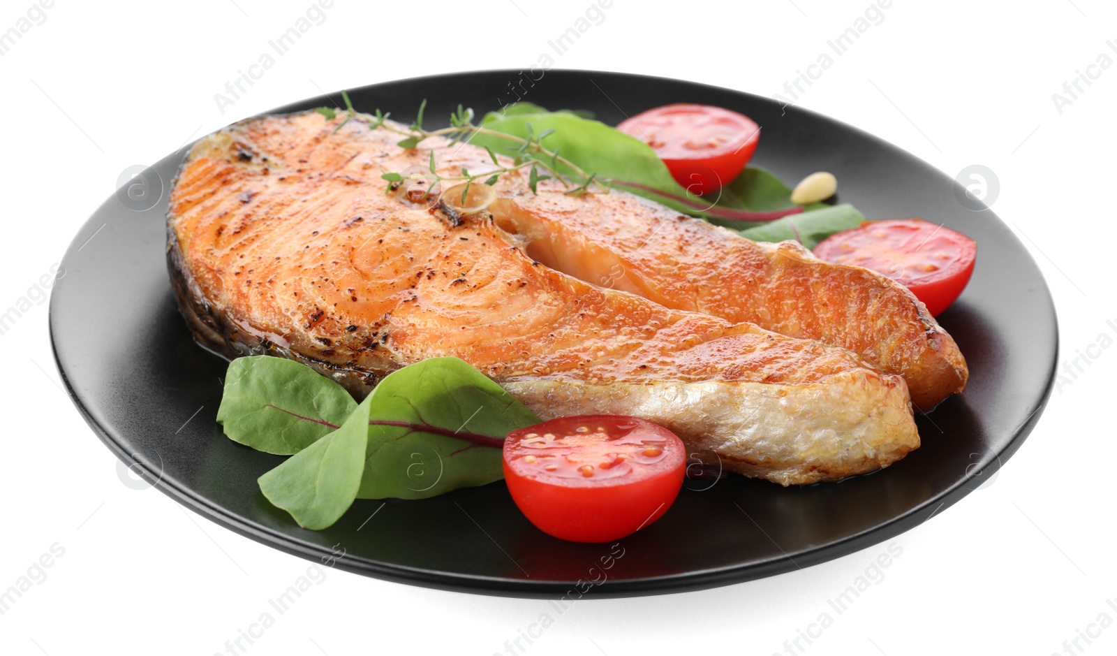 Photo of Plate with delicious roasted fish isolated on white