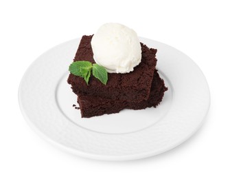 Photo of Tasty brownies with ice cream and mint isolated on white