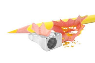 Photo of Yellow pencil, sharpener and shavings on white background