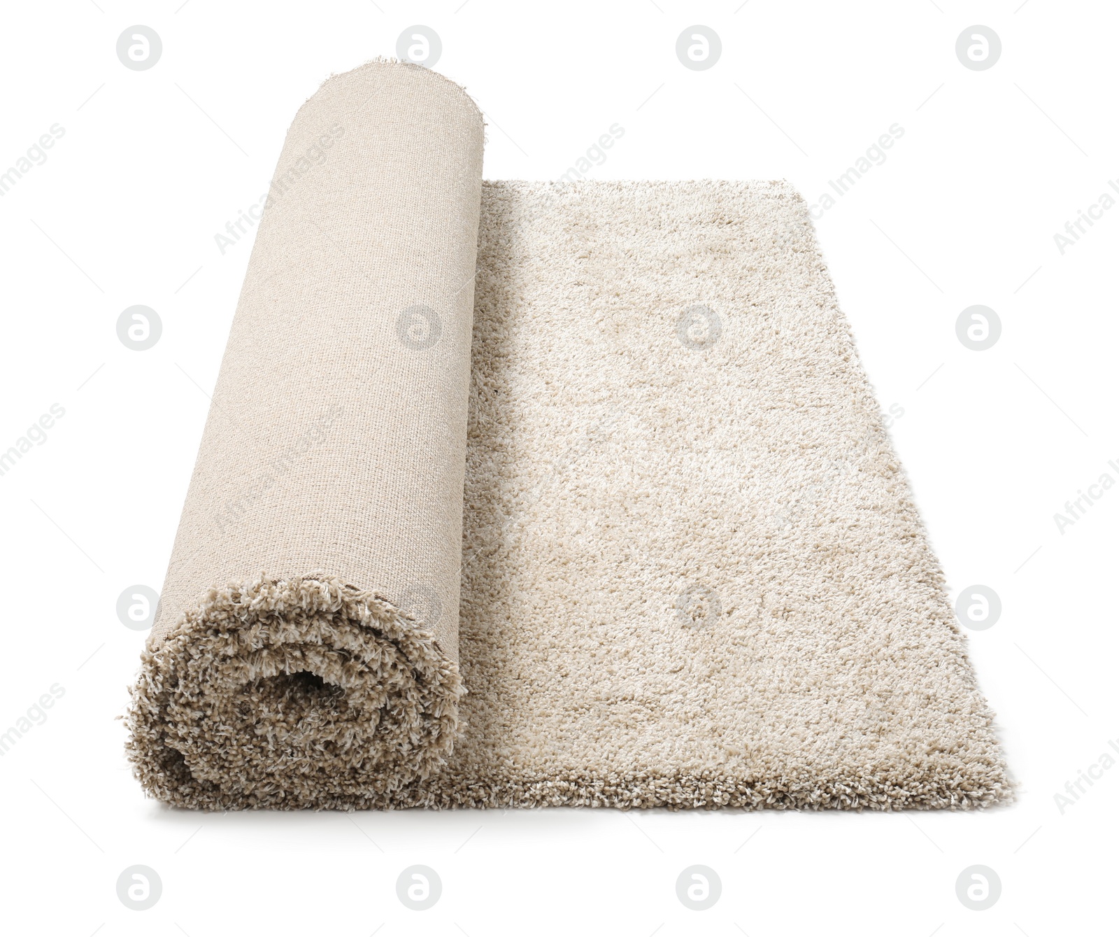 Photo of Rolled fuzzy carpet on white background. Interior element