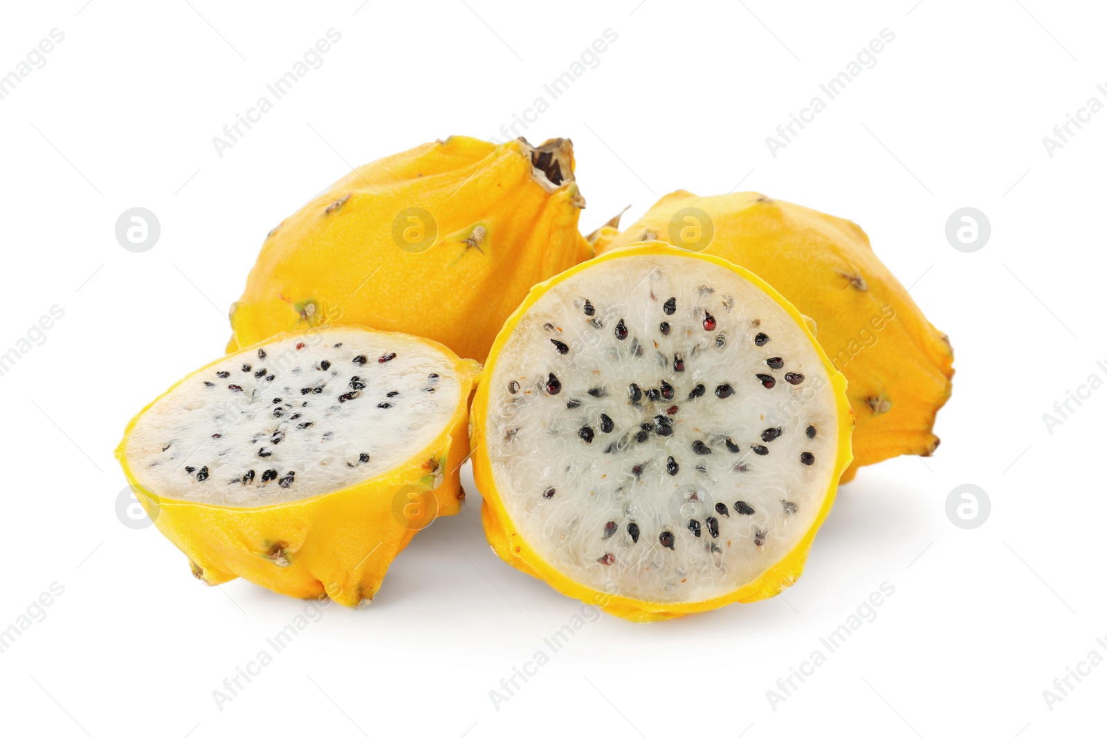 Photo of Delicious cut and whole yellow pitahaya fruits on white background