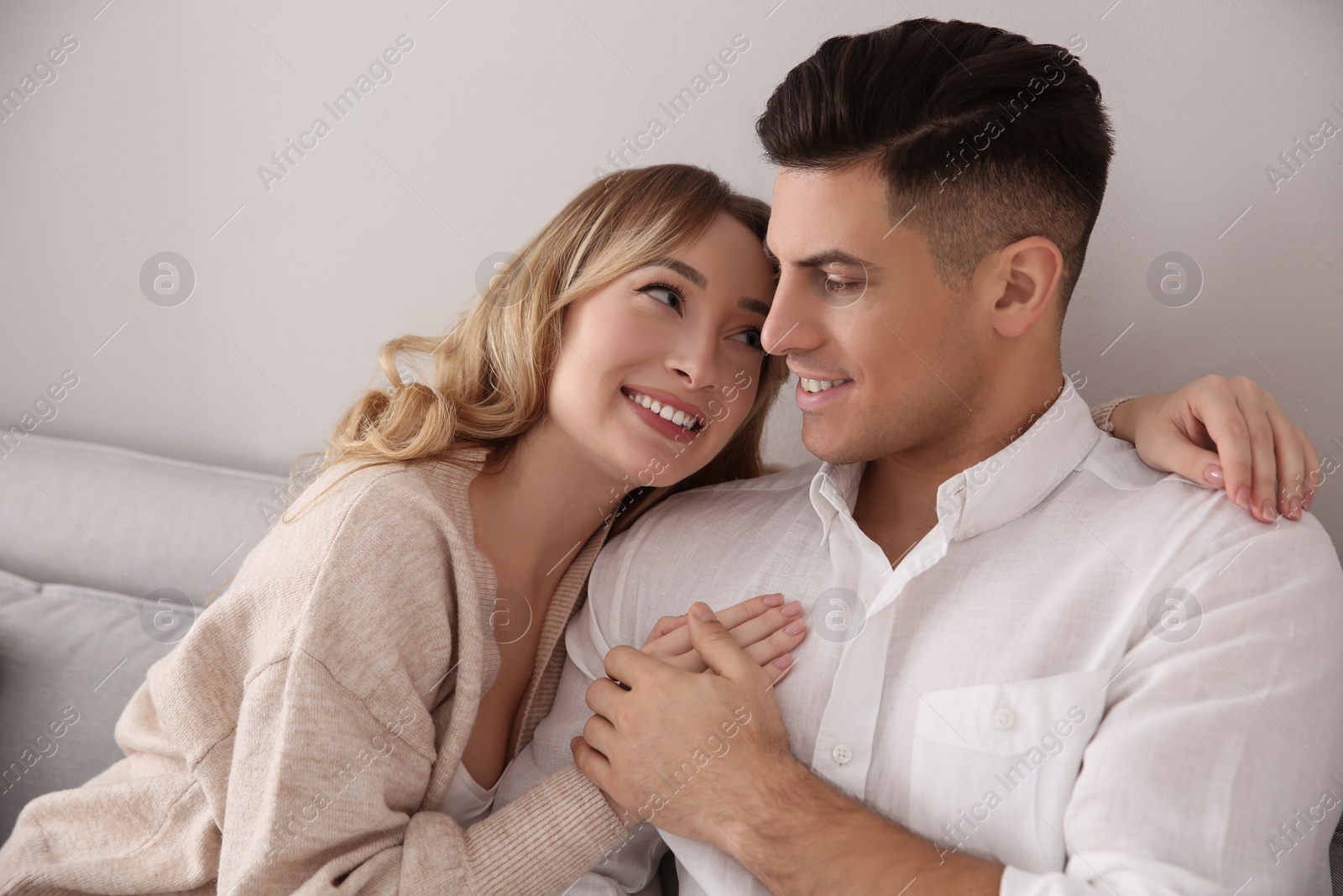 Photo of Lovely couple enjoying time together at home