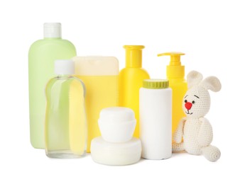 Photo of Set with different baby cosmetic products and dusting powder on white background