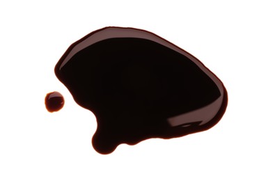 Puddle of soy sauce on white background, top view