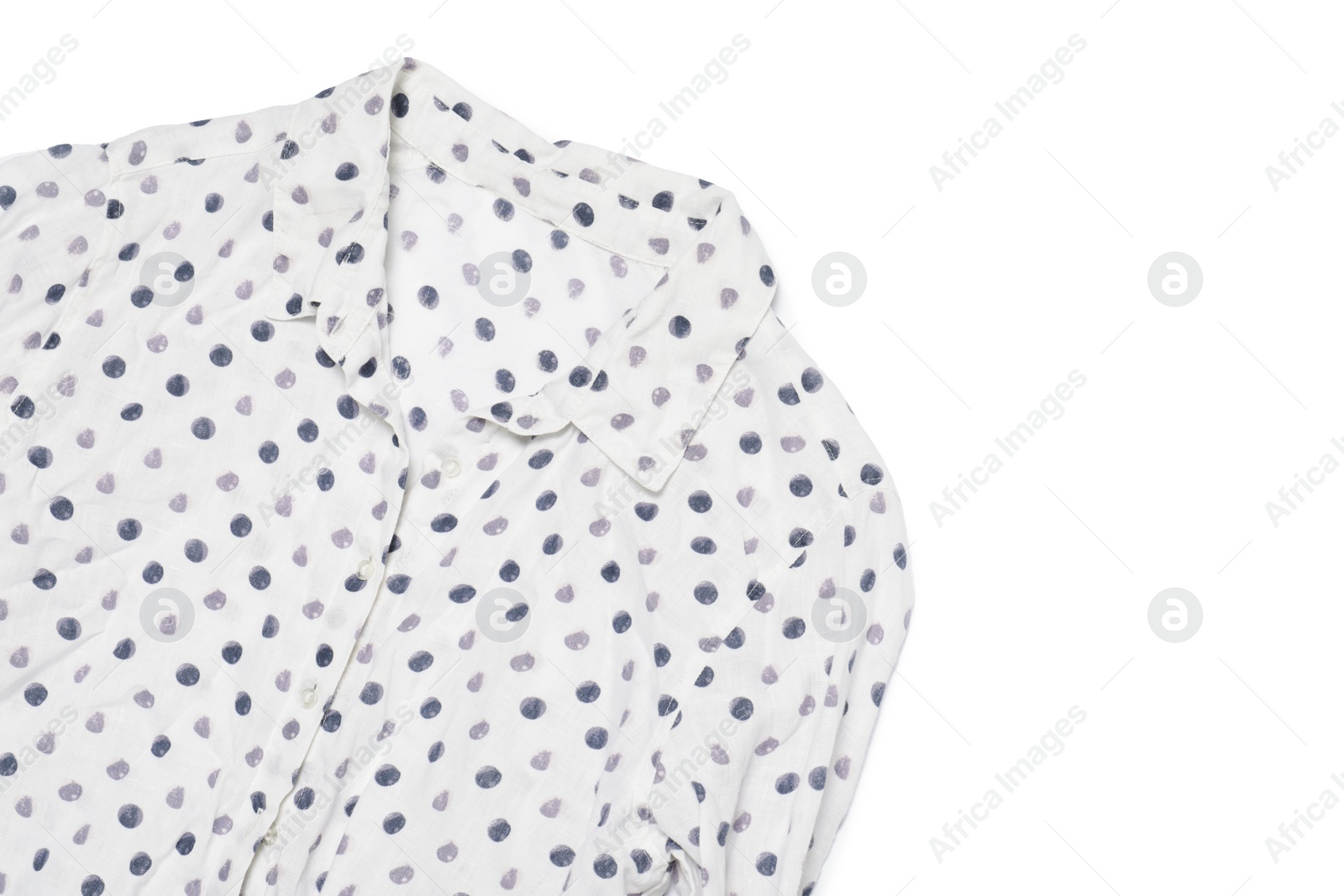Photo of Crumpled polka dot blouse on white background, top view. Space for text