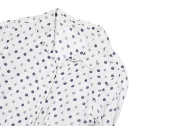 Photo of Crumpled polka dot blouse on white background, top view. Space for text