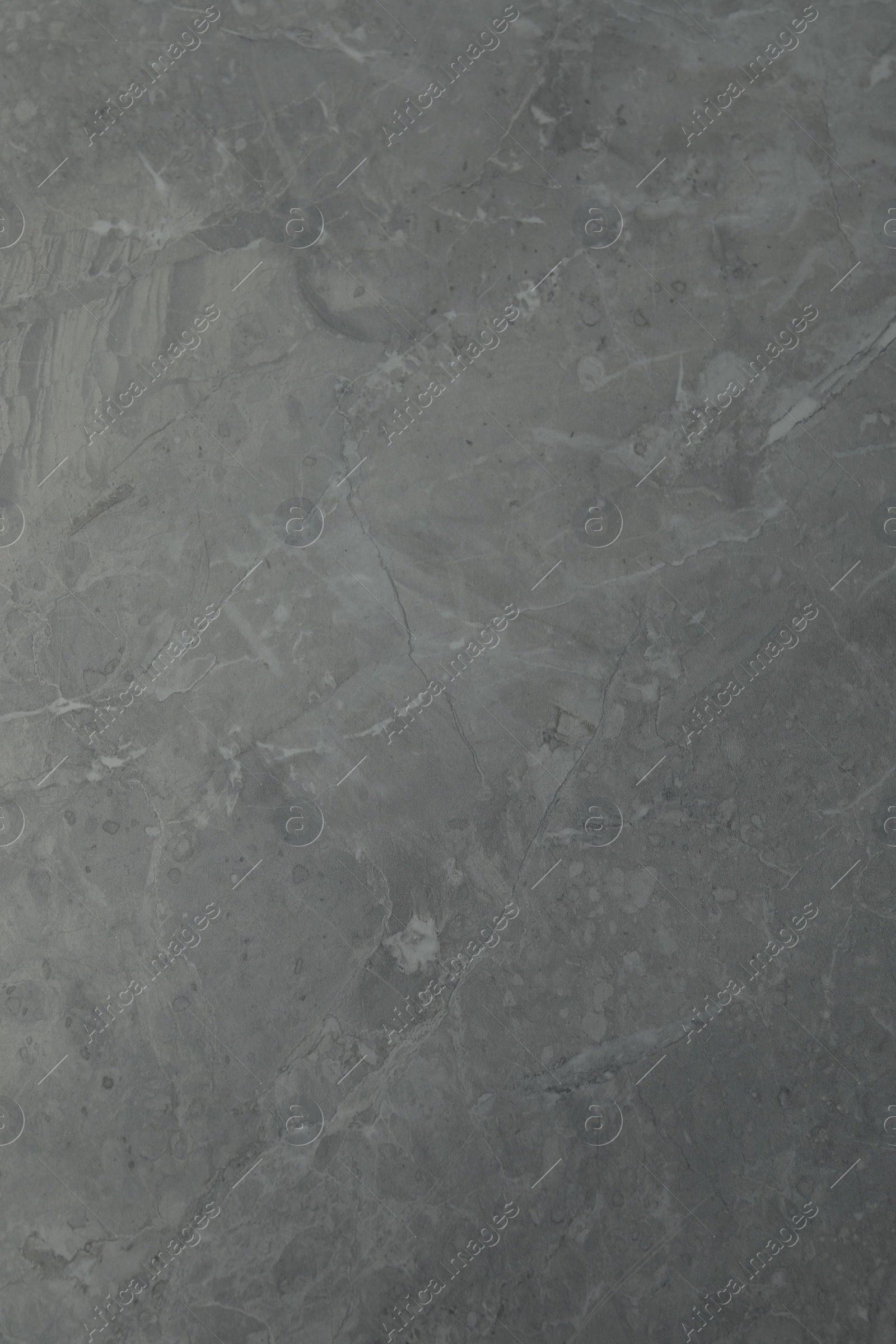 Photo of Texture of light grey marble surface as background, closeup