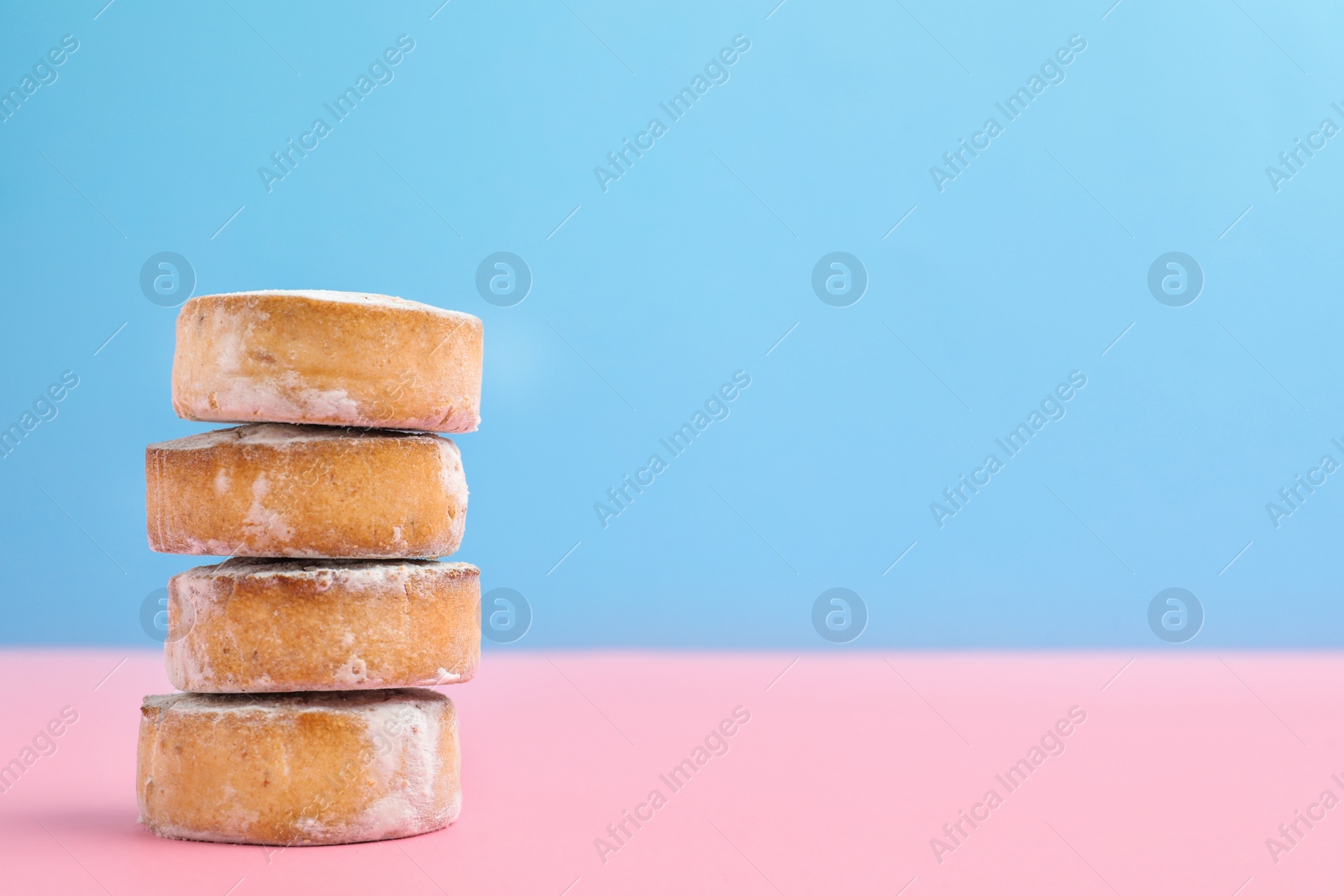 Photo of Sweet delicious butter cookies on color background. Space for text