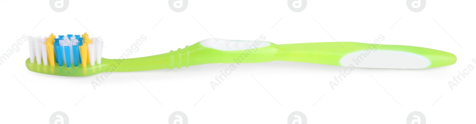 Photo of Light green plastic toothbrush isolated on white. Dental care