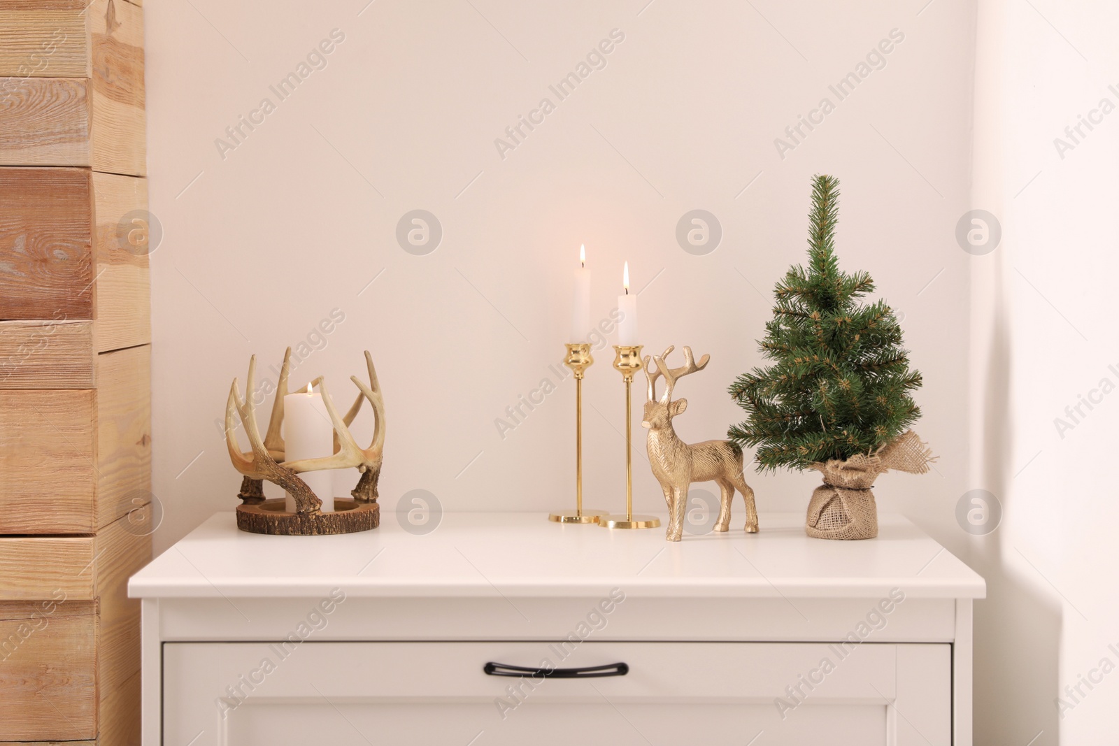 Photo of Beautiful Christmas decor in contemporary room. Interior design