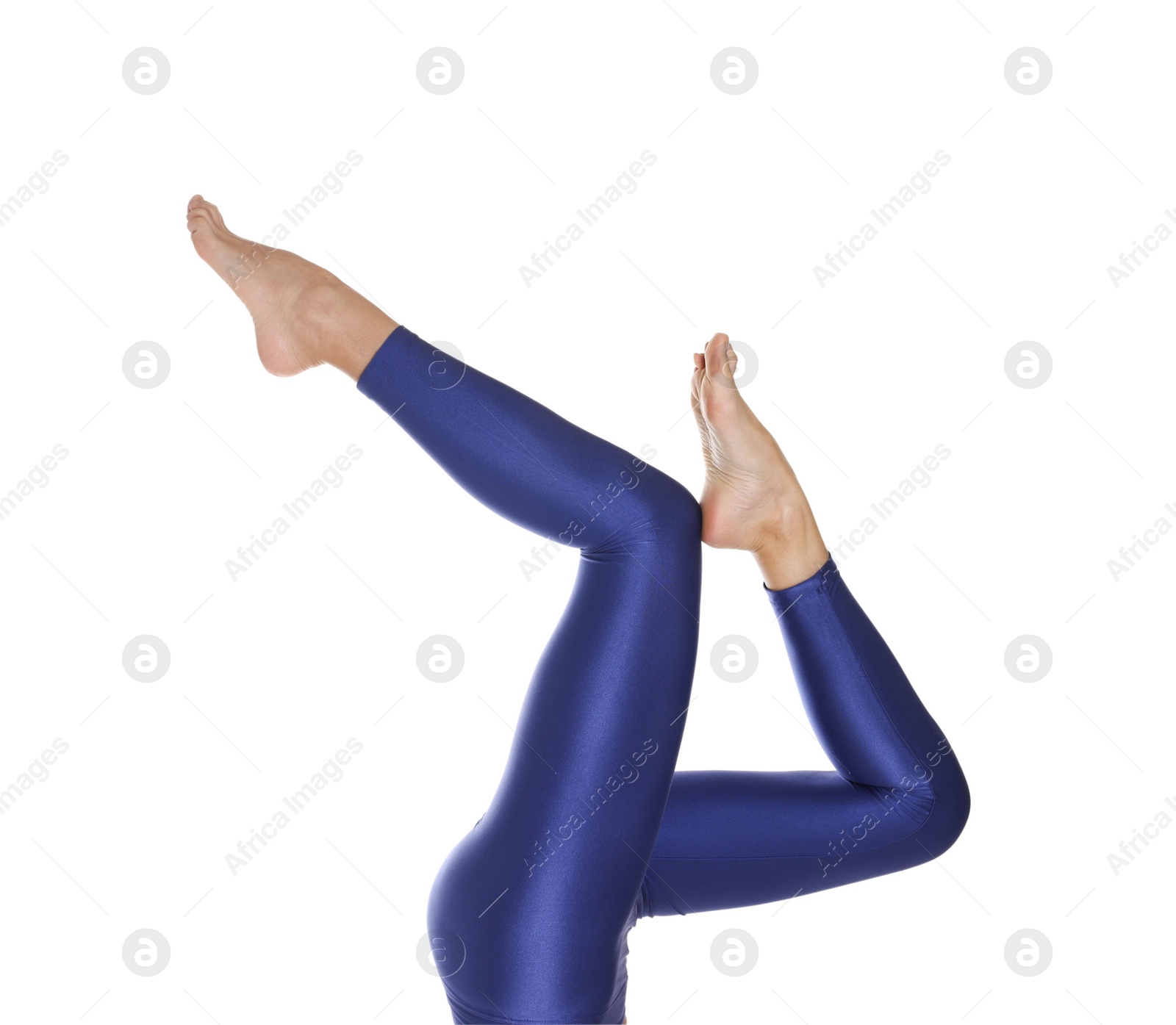 Photo of Woman with beautiful long legs wearing blue leggings on white background, closeup