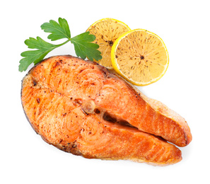 Photo of Delicious roasted fish with parsley and lemon isolated on white, top view