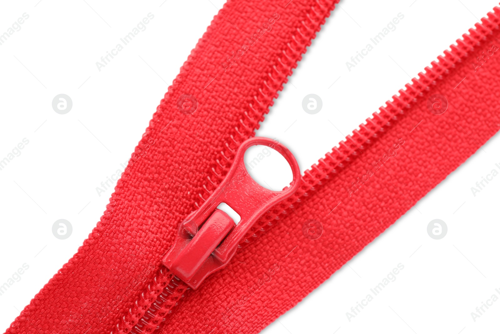 Photo of Red zipper on white background, top view