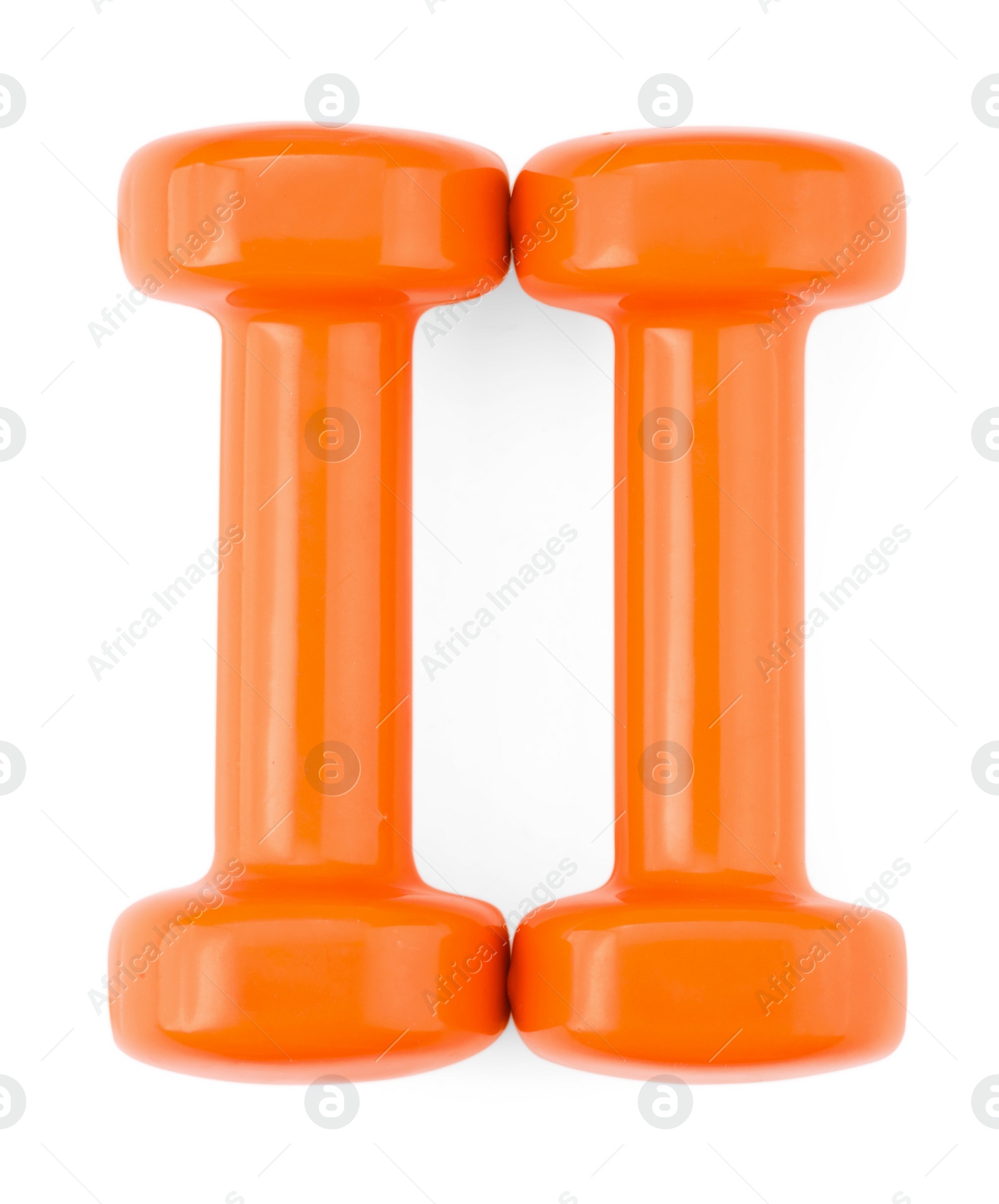 Photo of Orange dumbbells isolated on white, top view. Sports equipment