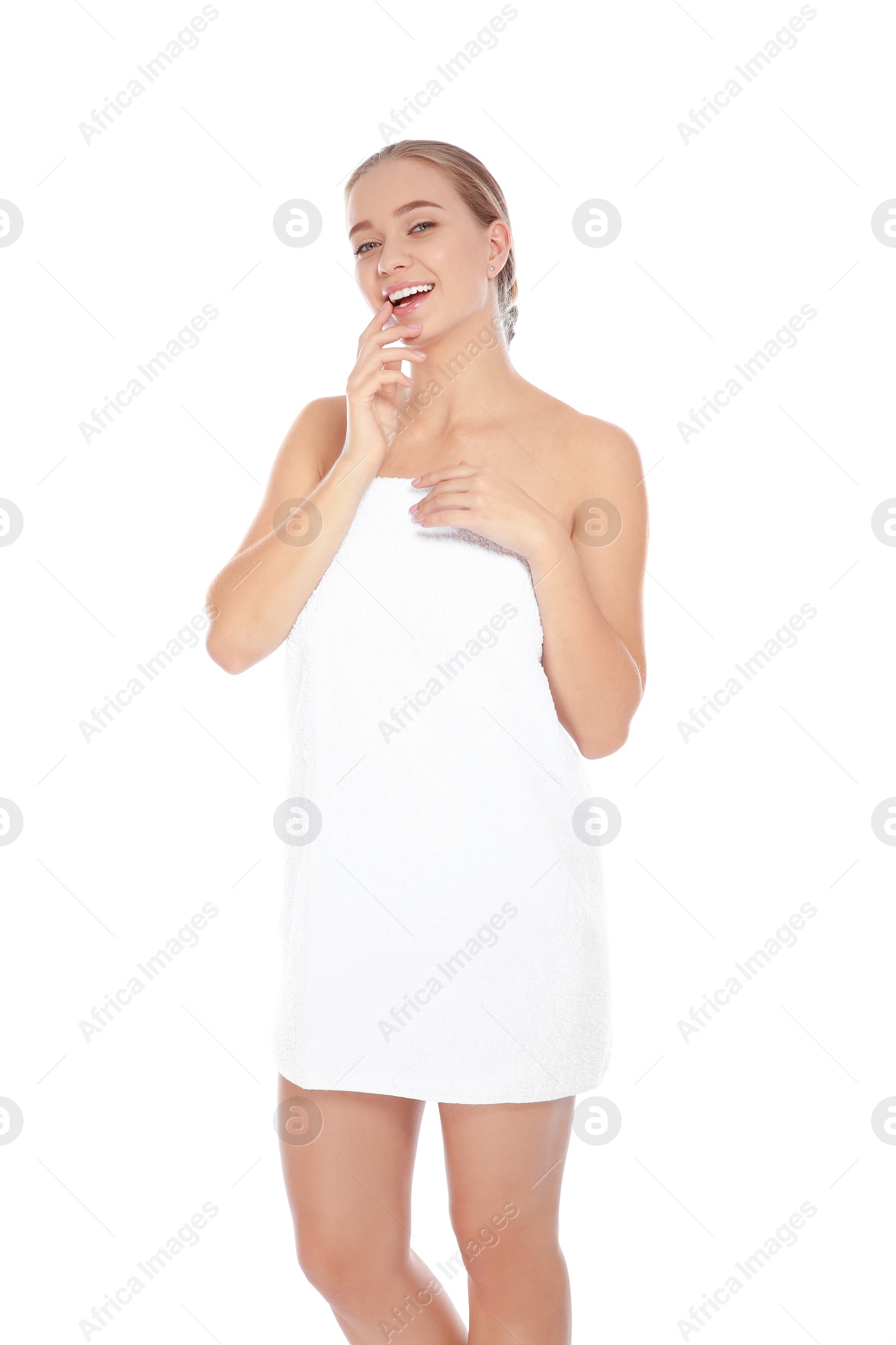 Photo of Portrait of young pretty woman with towel on white background