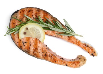 Photo of Tasty salmon steak with lemon and rosemary isolated on white, top view