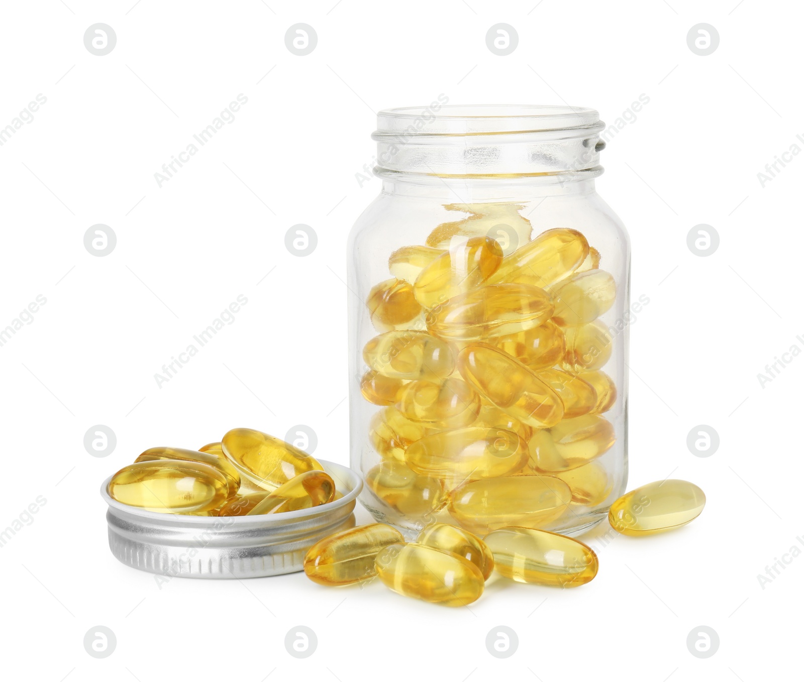 Photo of Bottle and pile of softgel capsules isolated on white