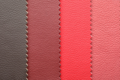 Photo of Leather samples of different colors for design as background, closeup