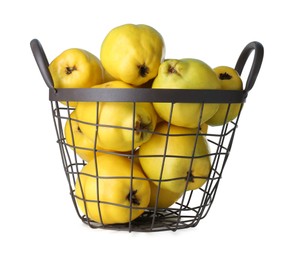 Photo of Basket with delicious fresh ripe quinces isolated on white