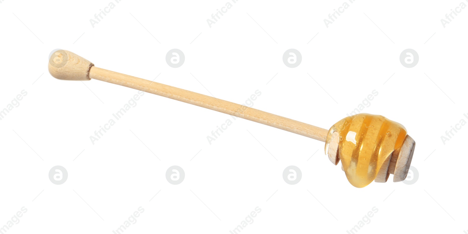 Photo of Natural honey dripping from dipper on white background