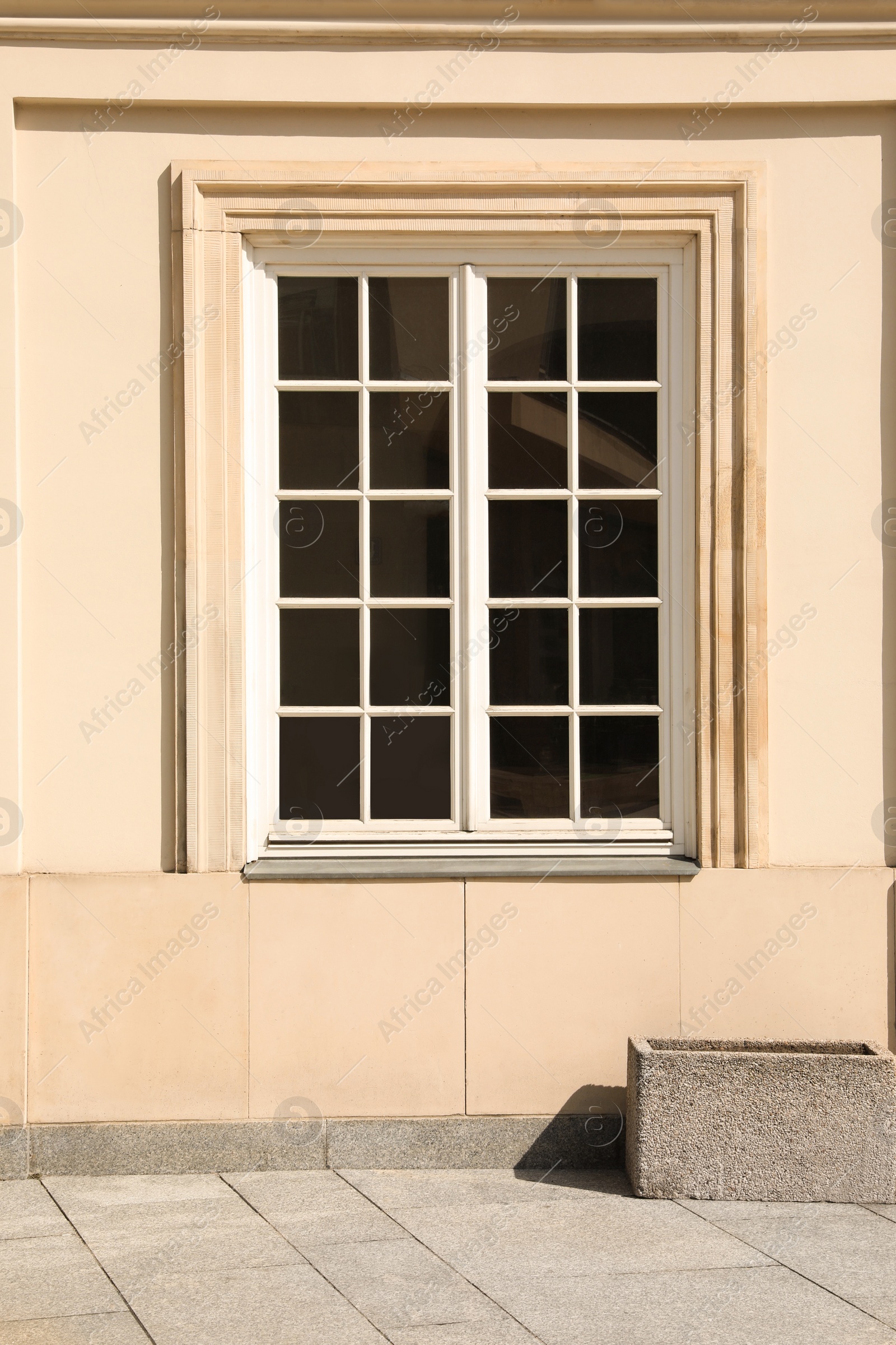 Photo of Building with window on sunny day, view from outdoors