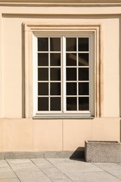 Building with window on sunny day, view from outdoors