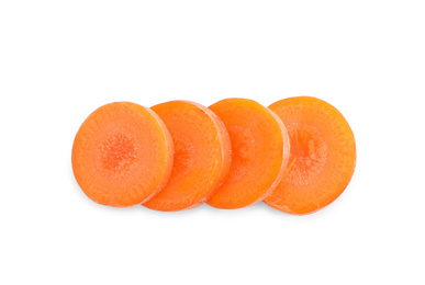 Photo of Slices of fresh ripe carrot isolated on white, top view