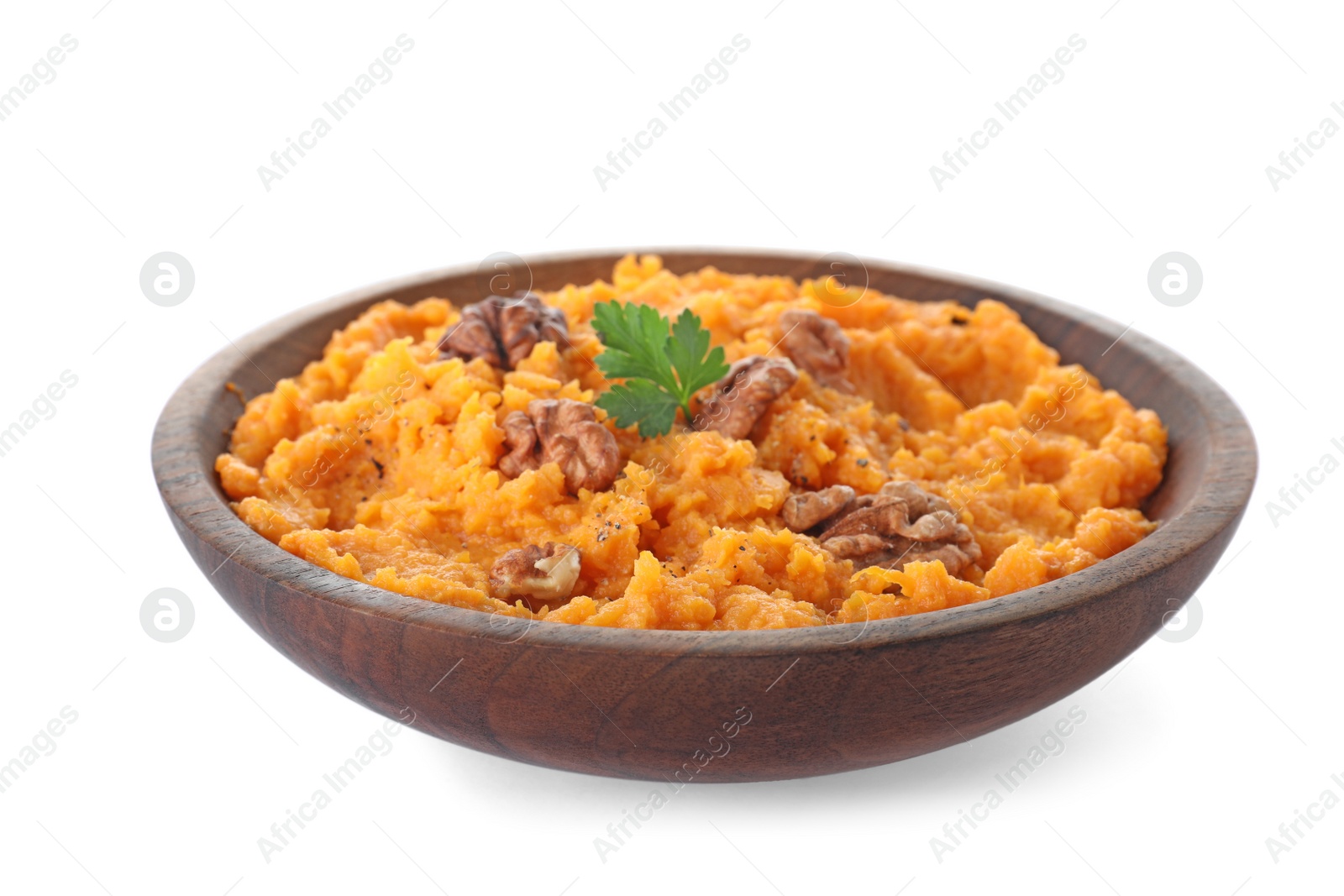 Photo of Bowl with mashed sweet potatoes on white background