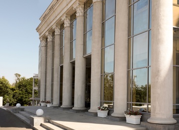 Photo of Supreme court building with pillars. Law and justice