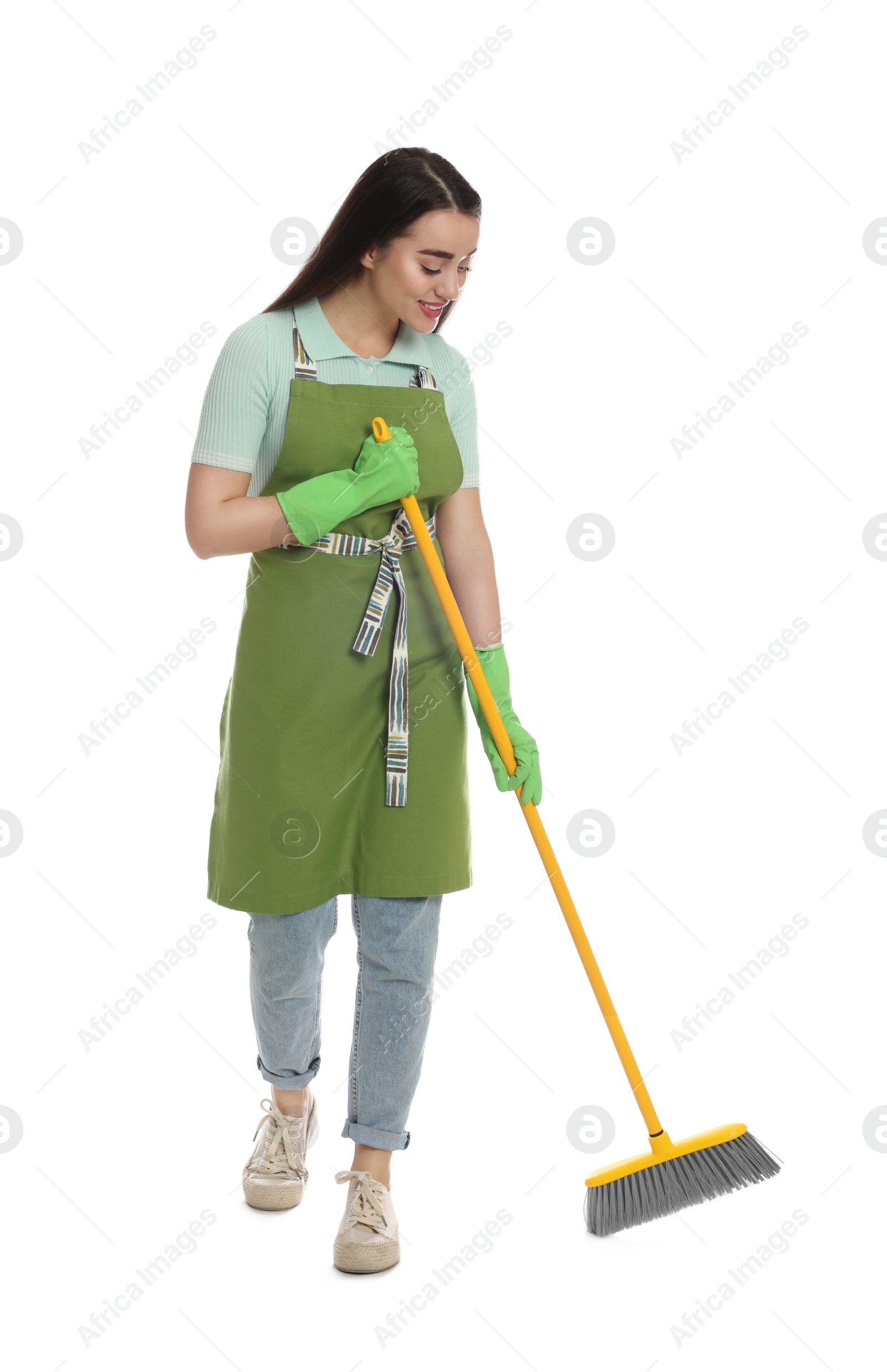 Photo of Beautiful young woman with broom on white background